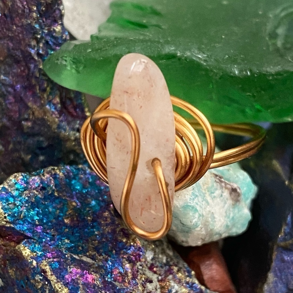 64 Milky Quartz gold toned wire wrapped ring